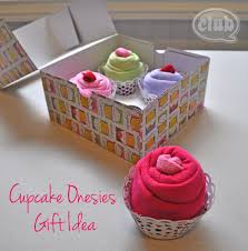 Whether you're the host or a guest, this collection of 6 diaper cake ideas can be a lovely way to inspire a thoughtful baby shower gift. Cupcake Onesies Gift Idea