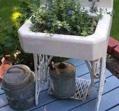 Pin By Down To Earth Garden Center On Garden Art Upcycle Garden Old Sink Outdoor Flowers
