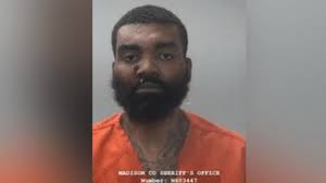 Man arrested following hours-long standoff, charged with 3 counts of  capital murder