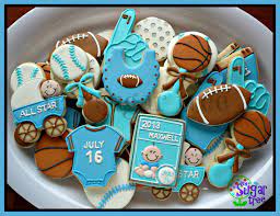 Pin By Sherrene Toews On Cookies By Sugar Tree Cookies Baby Shower Cookies Sports Baby Shower Baby Shower Treats