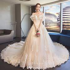 Classy Champagne See Through Wedding Dresses 2019 A Line Princess Scoop Neck Puffy Short Sleeve Backless Appliques Lace Cathedral Train Ruffle Princess Wedding Dresses Ball Gowns Wedding Wedding Dress Fabrics