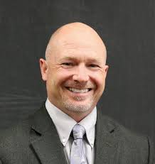 Ozark superintendent Chris Bauman plans to stay through at least 2023