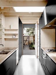 Black Cabinetry With Blonde Wood Plywood Kitchen Plywood Design Kitchen Interior