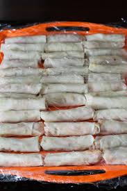 Gently drop the spring rolls into the oil and deep fry in batches. Nigerian Spring Rolls A Nigerian Small Chops Favorite Yummy Medley
