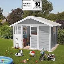 backyard ideas discover abri de jardin en pvc 75m deco gris clair et blanc grosfillex kit ancrage offert materi in 2020 hydrangea care backyard landscaping with rocks