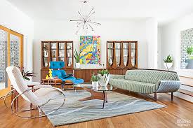 This vibrant, purple conversation pit is the relaxation nook that we've all been dreaming of. 4 Conversation Pit Essentials For Your Sunken Or Not Living Room