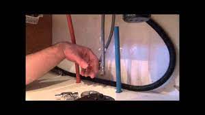 Pex plumbing under kitchen sink. How To Install Pex Pipe Waterlines In Your Home Part 3 Plumbing Tips Youtube