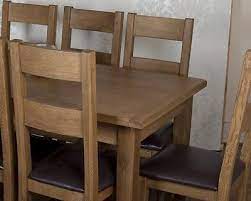 Extending dining table and 8 chairs ukfcu. Solid Chunky Rustic Oak Dorset Extending Dining Table 8 Chairs Rrp 1 719