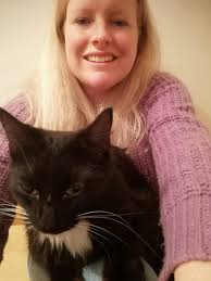 Hi. Is anybody missing a smallish black and white cat. Has white feet and  blaze