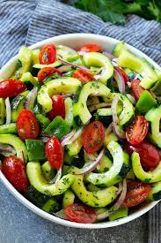Combine noodles, pecans, broccoli, romaine lettuce, and green onions in a bowl; Cucumber Tomato Salad Dinner At The Zoo