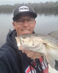 What bait and lure worked best for catching trout in 15-18' deep water?