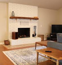 About a month ago i revealed my family room makeover. Painting A Brick Fireplace Beckwith S Treasures