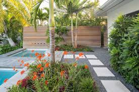 Modern Tropical Landscape And Pool Area Tropical Landscaping Modern Landscape Design Easy Landscaping