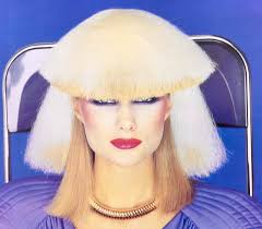 Vidal Sassoon striking a pose.