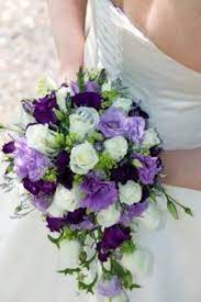 Wisteria is perfect for spring flowers for weddings if you want to achieve a cascading effect on your bouquet and decorations. Wisteria Wedding Bridesmaid Bouquets Purple Wedding Weddings Fun Stuff Wedding Forums Purple Wedding Bouquets Purple Bridal Bouquet Bride Bouquets White