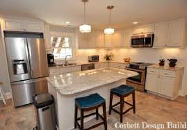 Create a feeling of light and space in your basement conversion, with stark white walls and light wood or large tiled flooring and a kitchen island. Goode Project Part 2 Basement Apartment Remodel In Raleigh
