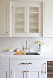 How to refresh a kitchen with oak cabinets i loved the unexpected sconce the builder put just to the side of the kitchen window and sink. 11 Gorgeous Marble Backsplashes That Ll Refresh Any Kitchen Martha Stewart