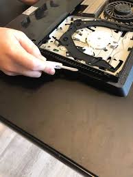 Then slide the cover off; How To Disassemble Clean And Reassemble A Ps4 Slim 14 Steps