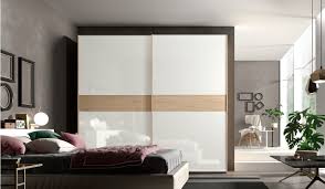 Some modular shelves are studded on the pink wall. Modular Bedroom Furniture Imab Group