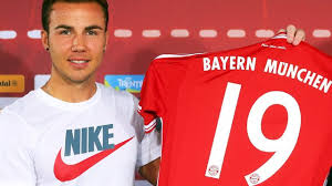 Red Faces For Bayern As Mario Gotze Wears Huge Nike Logo At Unveiling Bayern Mario Gotze Bayern Munich Shirt