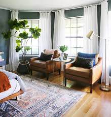 a seating area in the bedroom is one of life s little luxuries having a cozy intimate area where you can put your feet up and home bedroom bedroom green home
