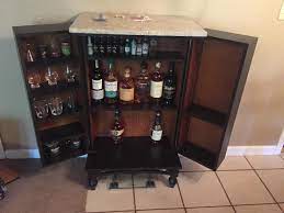 Rather than simply discarding the antiquated object, are transformed it into a quirky liquor cabinet. Almost Finished Putting Together My Diy Liquor Cabinet What Am I Missing Whiskeytribe