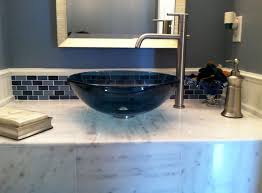 Glass Tile Backsplash Accent With Blue Glass Sink Custom Marble Vanity Www Goldeninteriors Com Amazing Bathrooms Glass Tile Glass Sink
