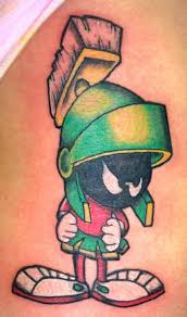 Get inspired by our community of talented artists. Marvin The Martian Rib Piece In Some Of My Tattoo Work By Wesley Owens Cartoon Tattoos Marvin The Martian Tattoo Air Tattoo