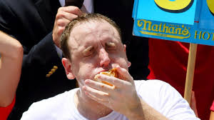 Joey chestnut defied the odds on sunday by breaking his own world record at the nathan's hot dog eating contest, and very few gamblers had faith in him leading up to the event. Joey Chestnut Breaks Hot Dog World Record With 75 In 10 Minutes Video