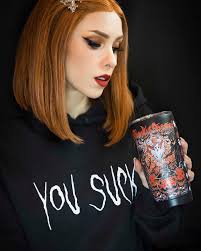 What's the best autumn drink? Drink it from our Spooky Season 20 oz Travel  Mug. 📷 @kattslade in our You Suck Hoodie #SpookySeason #Halloween  #HalloweenSeason #Spooky #VampireFreaks #Ghosts #pumpkins
