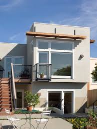 Louis every home is unique and every homeowner expresses their style differently. Modern Minimalist Exterior House With Exterior Glass Windows Plus Their White Trims And Wood Canopy Exterior Sta Exterior Stairs House Exterior Modern Exterior