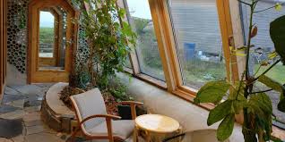 Wooden architecture architecture student interior architecture kids house garden berlin photos pergola designs porches tiny house coding Inside Germany S Self Sufficient Upcycled Earthship House