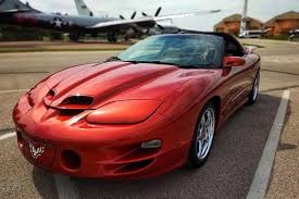 Image result for Sunset Orange 2001 Pontiac