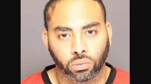 Charges: 'Trump supporter' swings golf club at couple with political sign