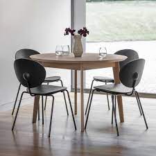 Choosing the right dining table and dining chair can create a perfect setting for it to take place. Grey Novato Round Dining Table 110cm Modern Dining Tables