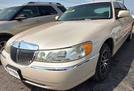 Image result for Light Parchment Gold 1999 Town Car