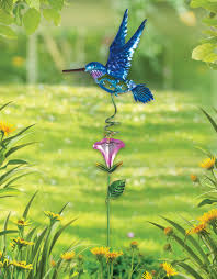 This bold feeder has a dark blue, blown glass reservoir, topped with a red feeding flower. Ophelia Co Louvenia Hummingbird Garden Stake Reviews Wayfair