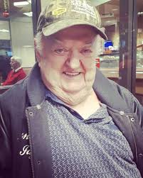 Respectful Gesture During Funeral Procession