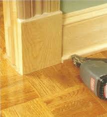 5 Steps Installing Baseboard Trim Ehowdiy Com Baseboard Trim Baseboards Moldings And Trim