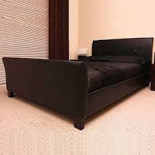 King sleigh beds the regal size of the king sleigh bed adds an extravagant layer of ornamentation to a decorating scheme. Winchester Faux Leather Sleigh Bed Luxury Leather Beds Beds Co Uk The Bed Outlet