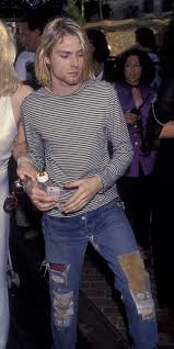 In the 90s there were three ways to wear flannel, jeans and a wife beater.☯ top button buttoned. 5 Ways To Get Kurt Cobain S Signature Grunge Look Vogue