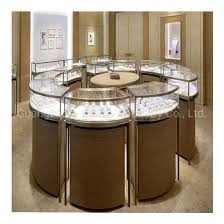 Jewelry cabinet can use this glass to make jewelry products more beautiful. Custom Jewelry Retail Round Stainless Steel Glass Display Table Cabinet China Display Cabinet And Display Table Price Made In China Com