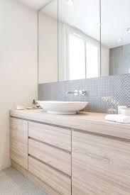 6 Tips To Make Your Bathroom Renovation Look Amazing Modern Bathroom Cabinets Bathroom Cabinets Designs Bathroom Design