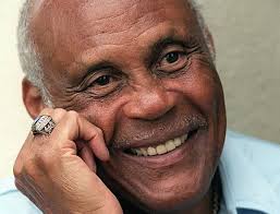 When Ernie Davis won the Heisman in 1961, southern school coaches raised  eyebrows. When Mike Garrett won 4 years later, some of them probably saw  the writing