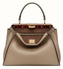 (left photo by juergen teller for arena homme+ winter/spring edition cover story. Fendi Peekaboo The Handbag Concept