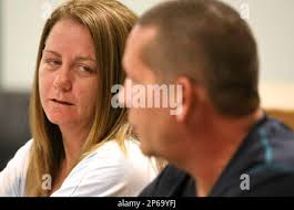Suzanne Ristau, of Cascade, Iowa, answers questions during a press  conference with her husband Randy Ristau Friday, July 20, 2012, at City  Hall in Cascade, Iowa. Their son, Sgt. Michael Ristau, a
