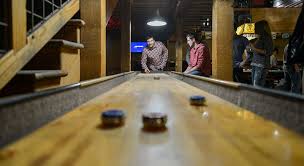 Players have to play the game until one of the teams scores 15 points to win. Table Shuffleboard How To Play Win Every Time Gamingweekender Com