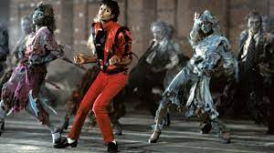 Black military overcoat with red armband. Michael Jackson Thriller Costume Guide For Moonwalker