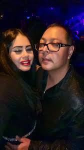 Can someone open my husband's and my eyes in this photo?