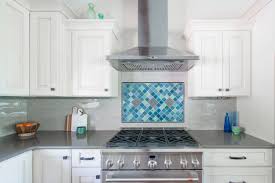 Ceramic tile or possibly stone in a expected pattern. Kitchen Backsplash Ideas From Bold To Traditional